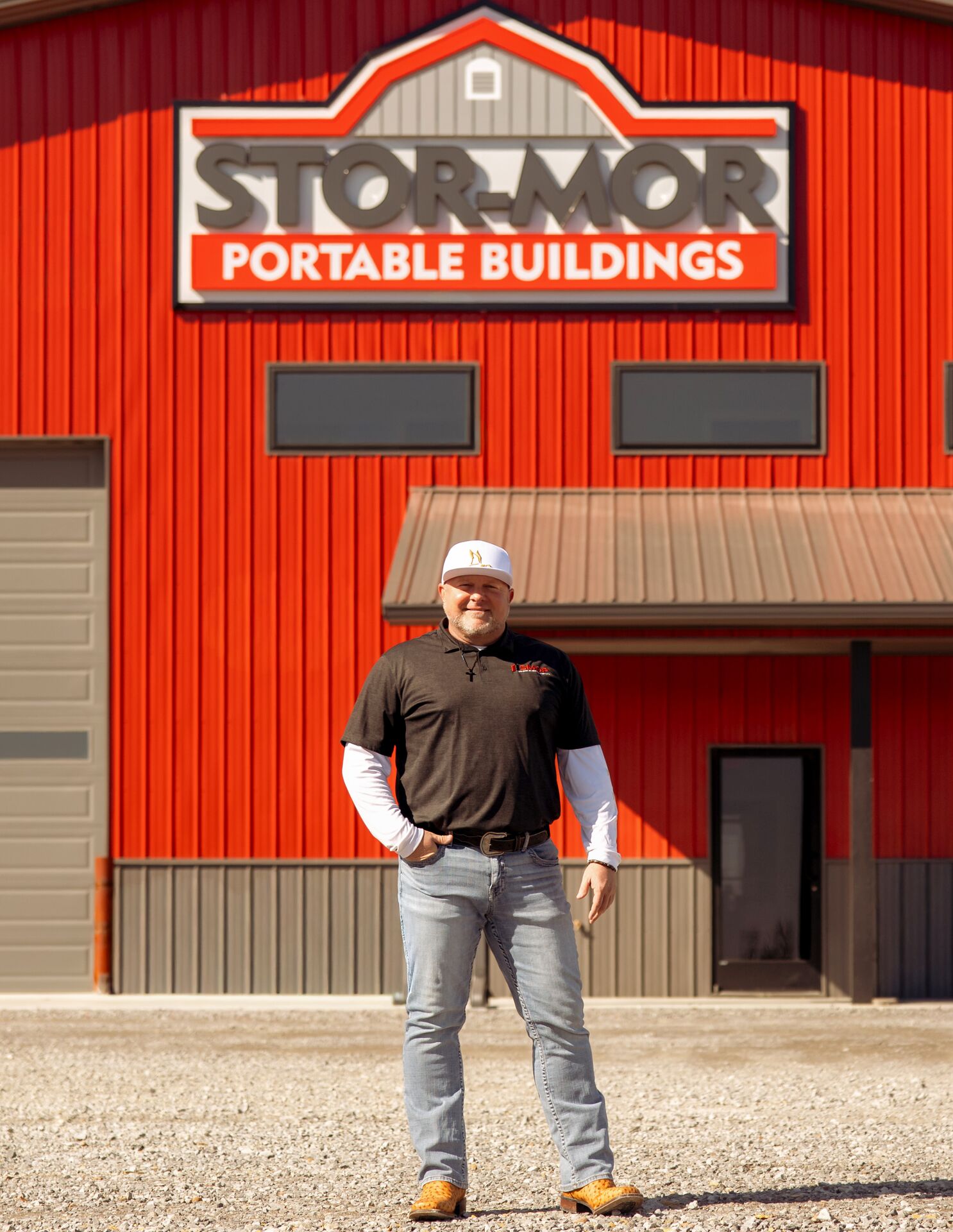 Darren Warren in front of Stor-Mor Building