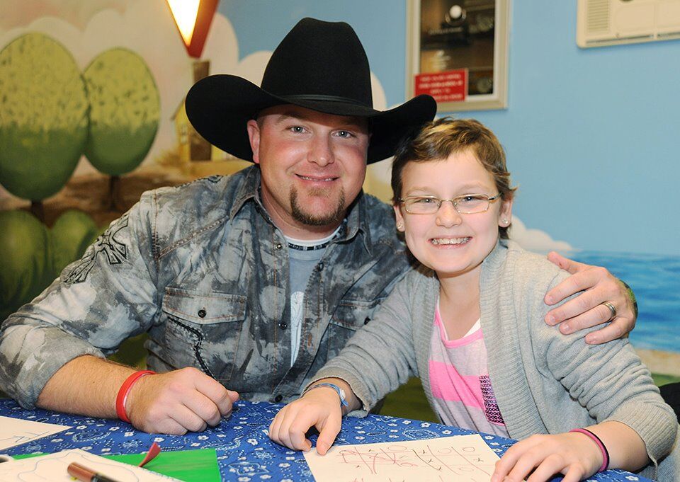 Darren Warren with St. Jude patient Elise